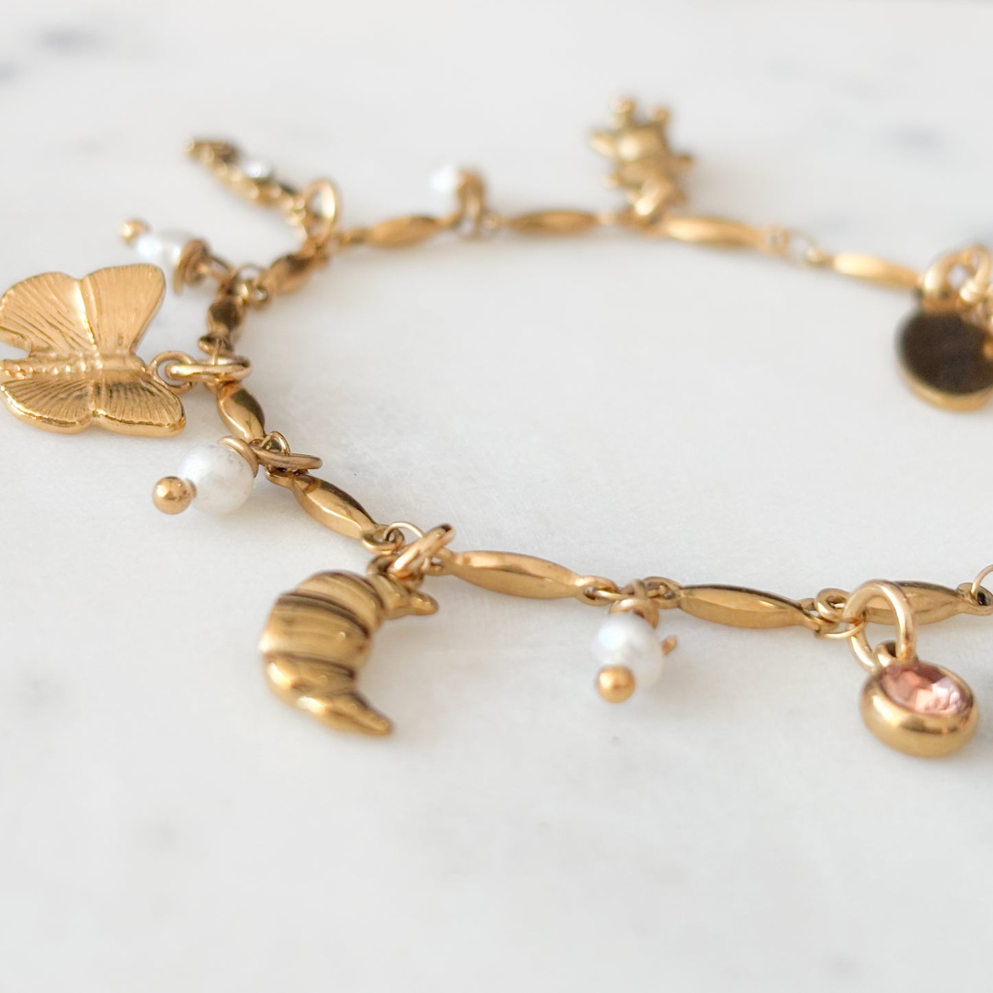 Stainless steel bedel armband goud
