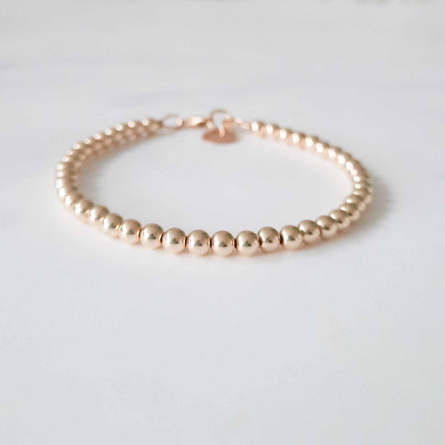 Gouden waterproof armband met 4mm kralen