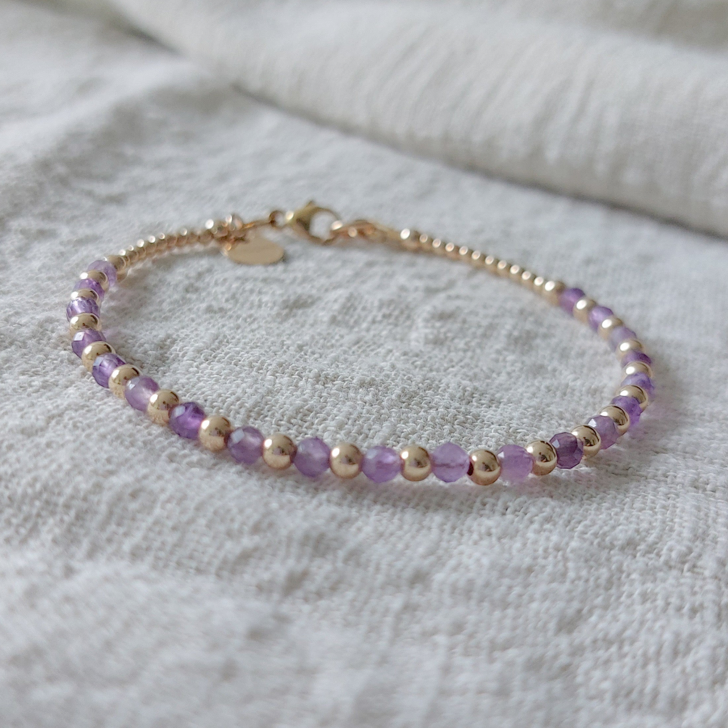14k Goldfilled armband met paarse amethist kralen