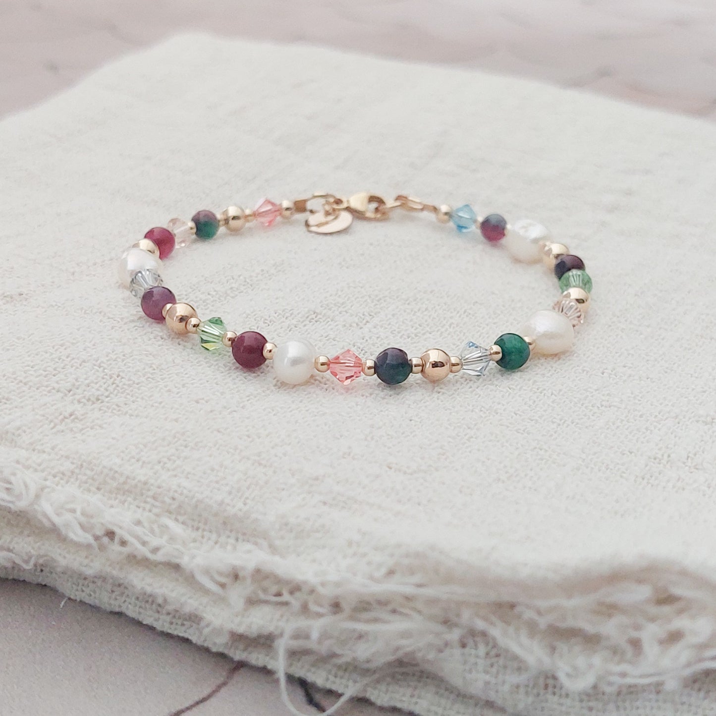 Goldfilled kralen armband met kleurrijke natuursteen en gouden ralen