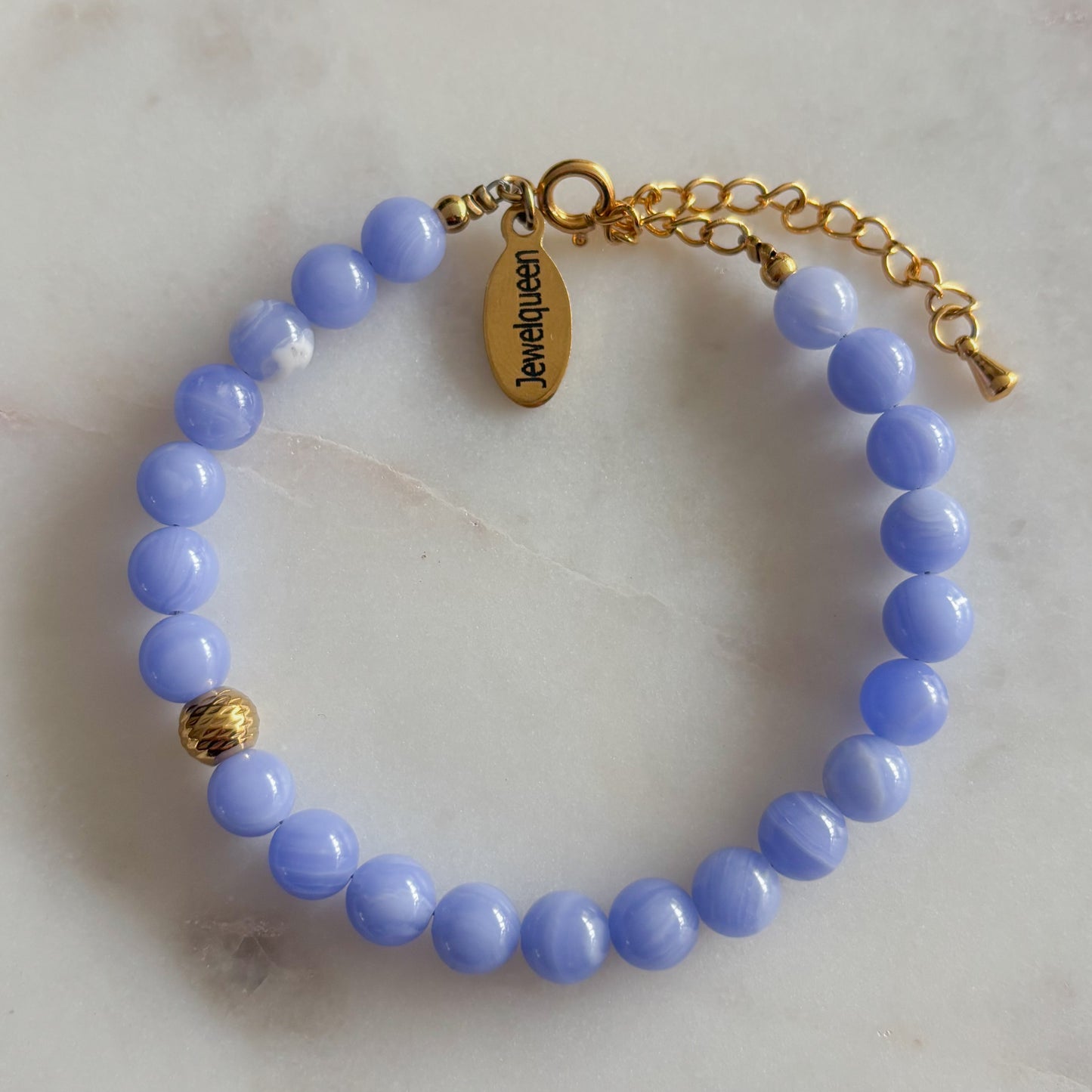 Rvs gouden armband met blauwe kralen