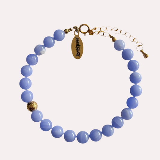 Gouden kralen armband met blauwe tijgeroog