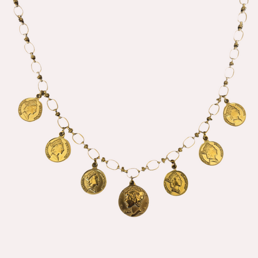 Gouden schakel ketting met munten bedels