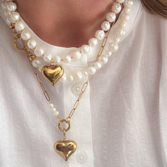 Vrouw et gouden rvs parel en schakel kettingen met hart hanger