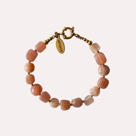 goud rvs armband met roze natuursteen