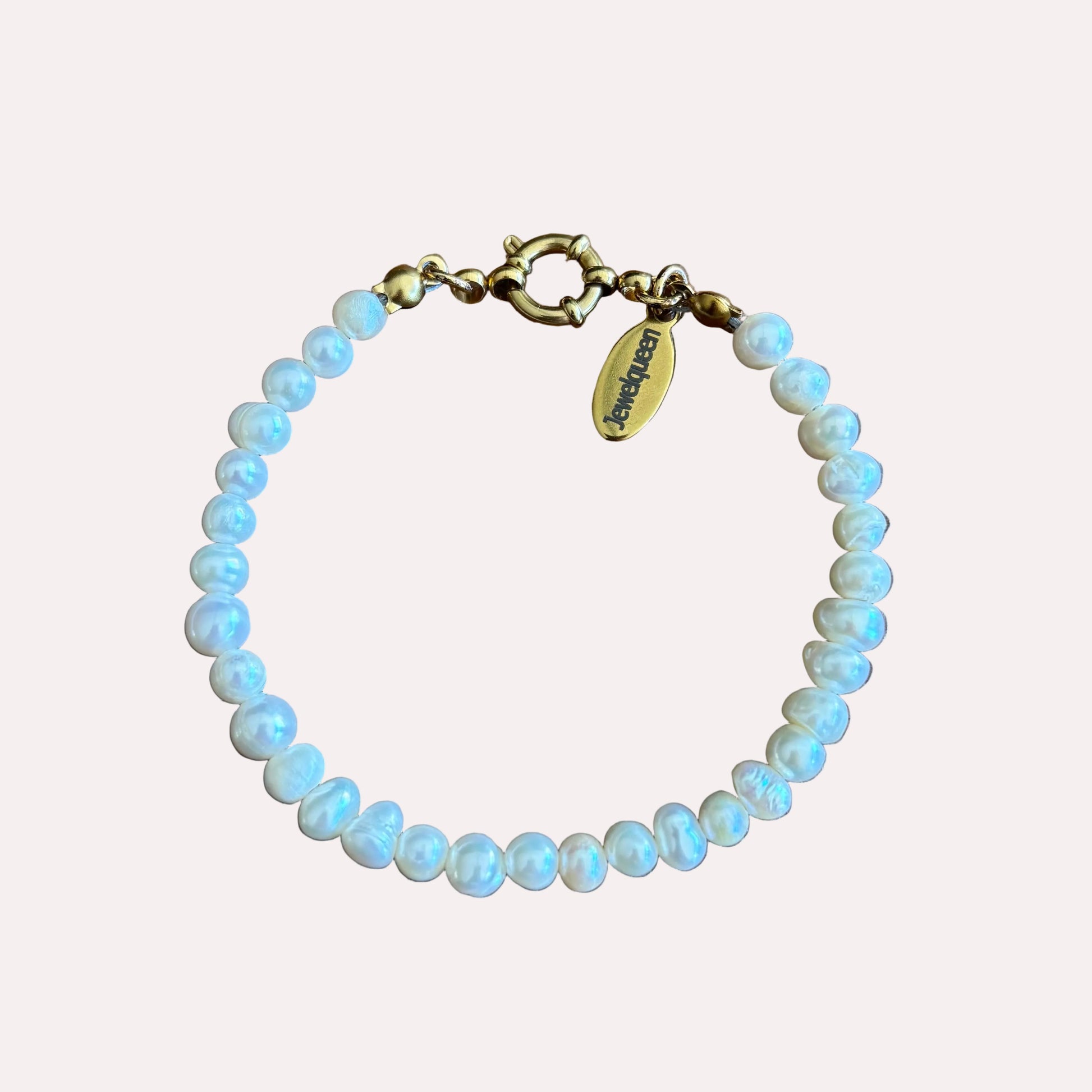 witte parel armband met goud rvs