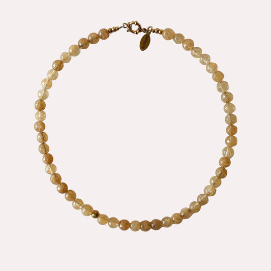 rvs gouden ketting met zacht gele kralen