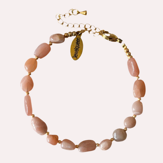 Rvs gouden armband met roze steentjes 