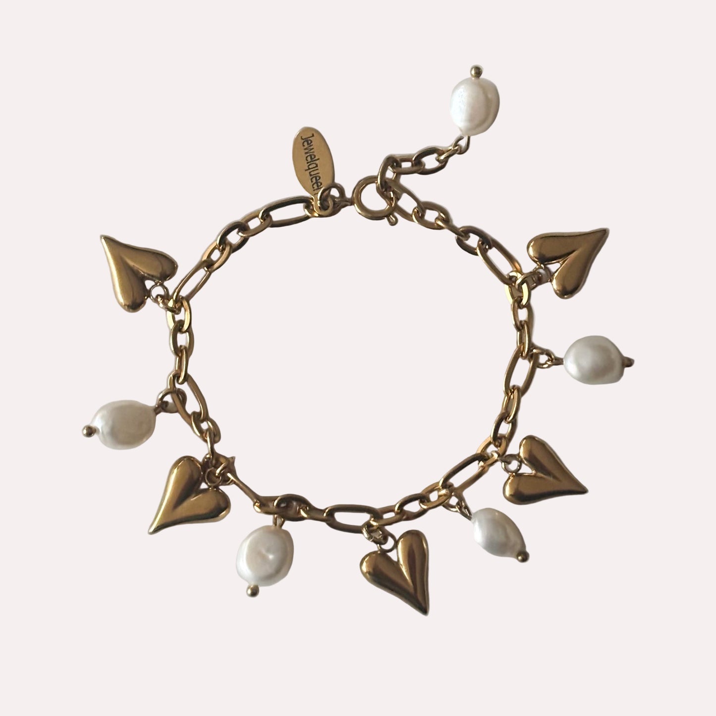 Rvs gouden armband met witte parels en hartjes 