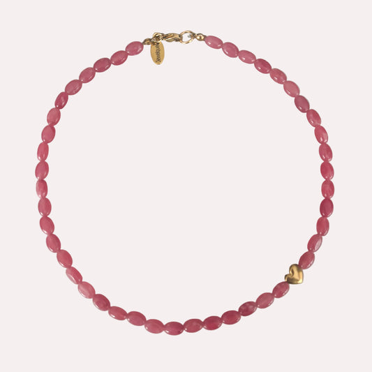 ketting met roze kralen en gouden rvs hart kraal