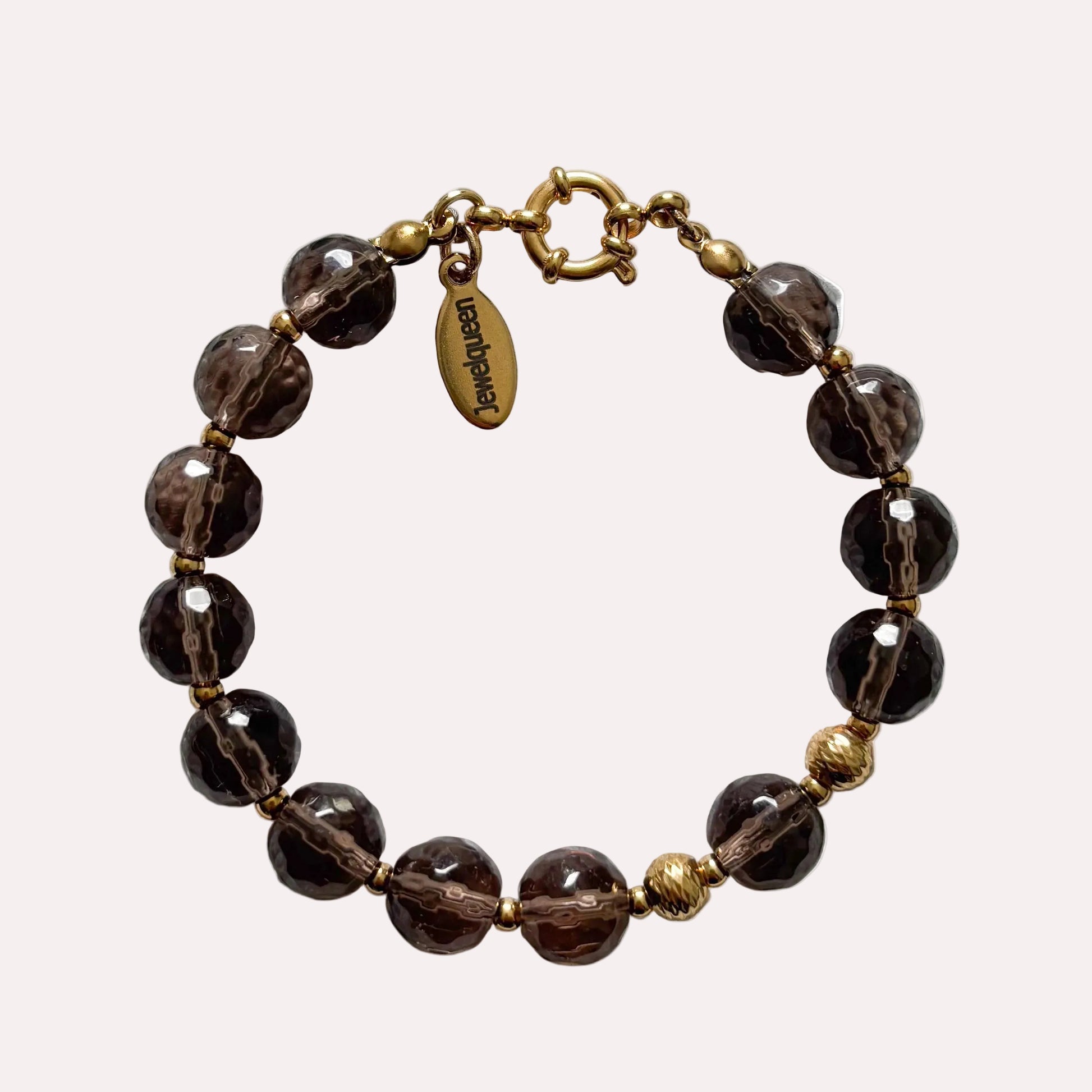 armband met grote bruine las kralen en goud stainless steel
